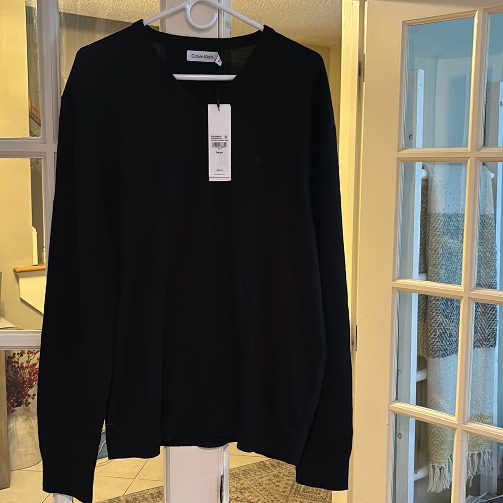 Men’s size large Calvin Klein v neck black sweater